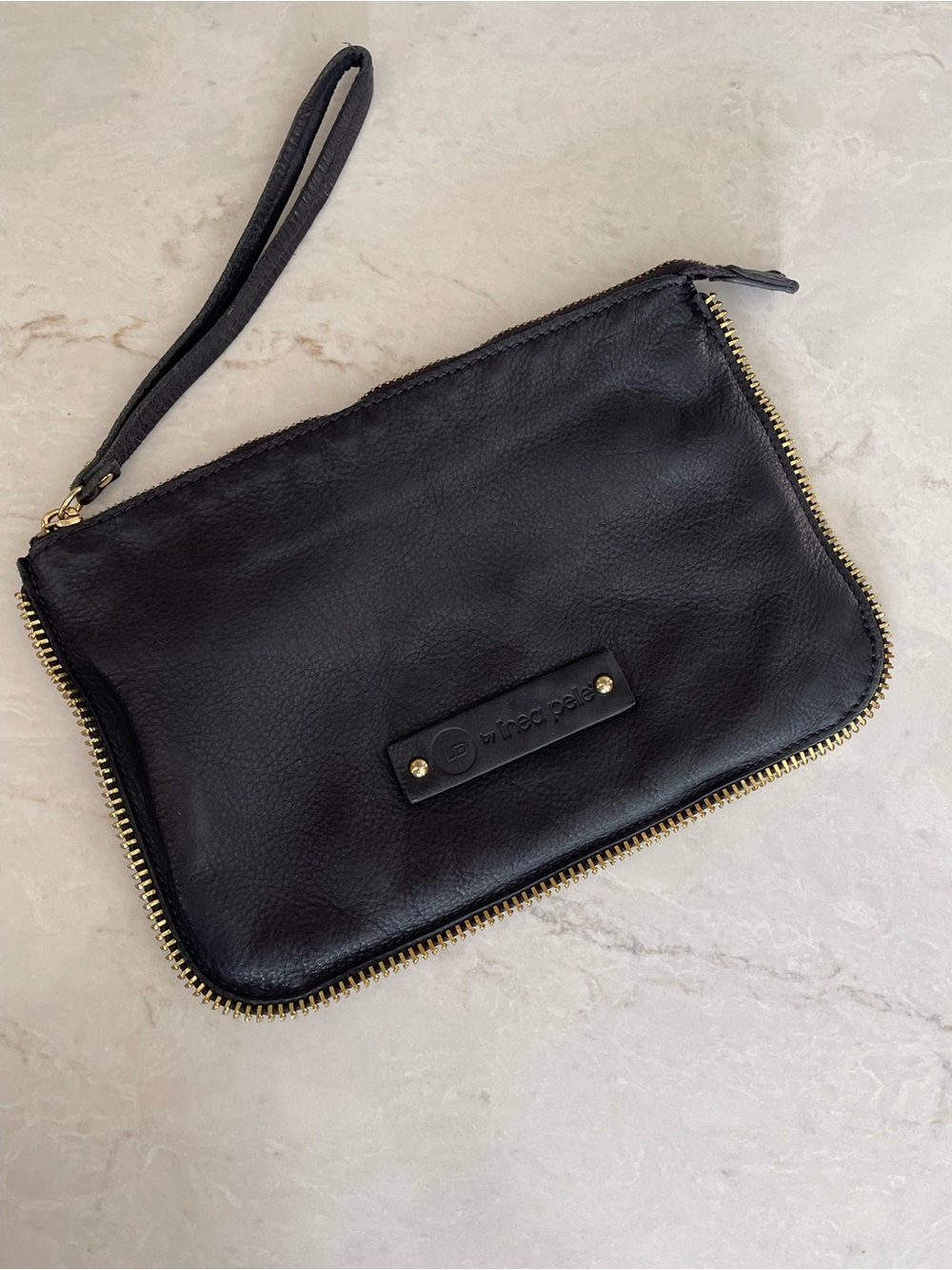 LINEA PELLE Black Pebble Leather Clutch with Gold Zipper Trim and Wrist Strap